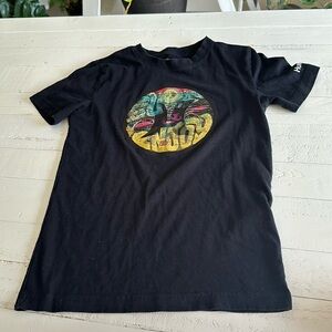 Hurley size 8/10 holograph surf and enjoy skeleton image on front